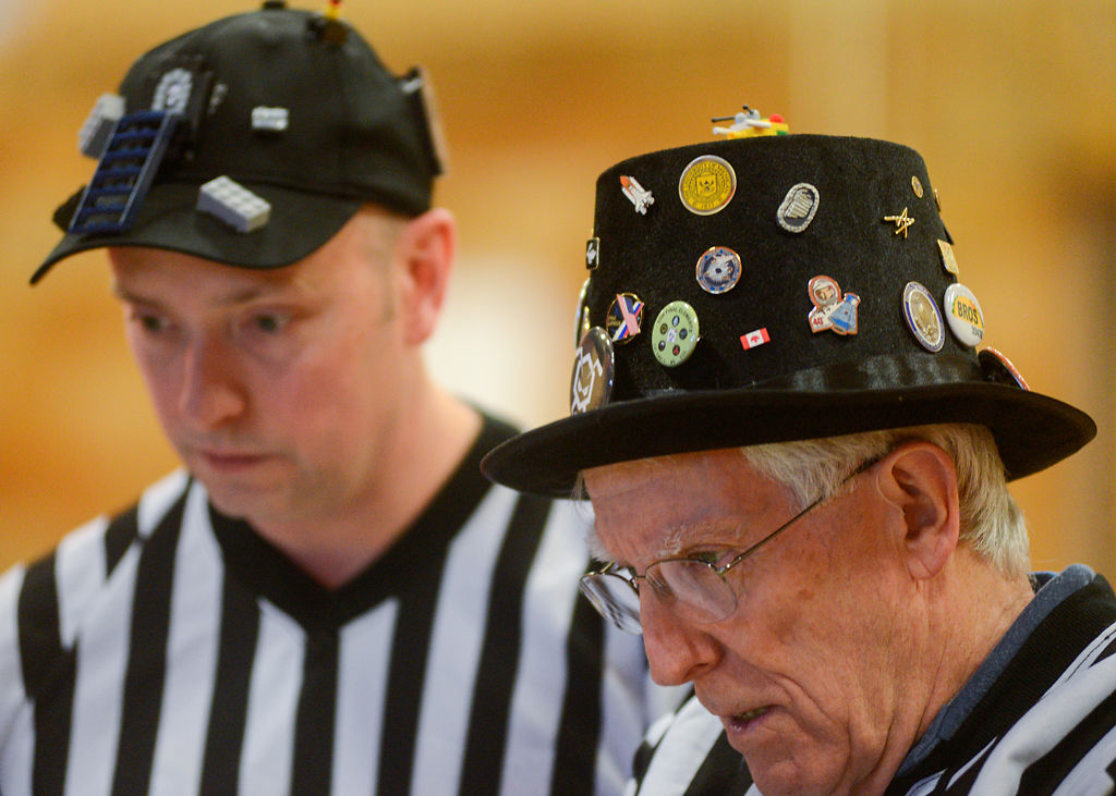 From left, Chris Claunch and head referee Rob McKenzie judge a competition